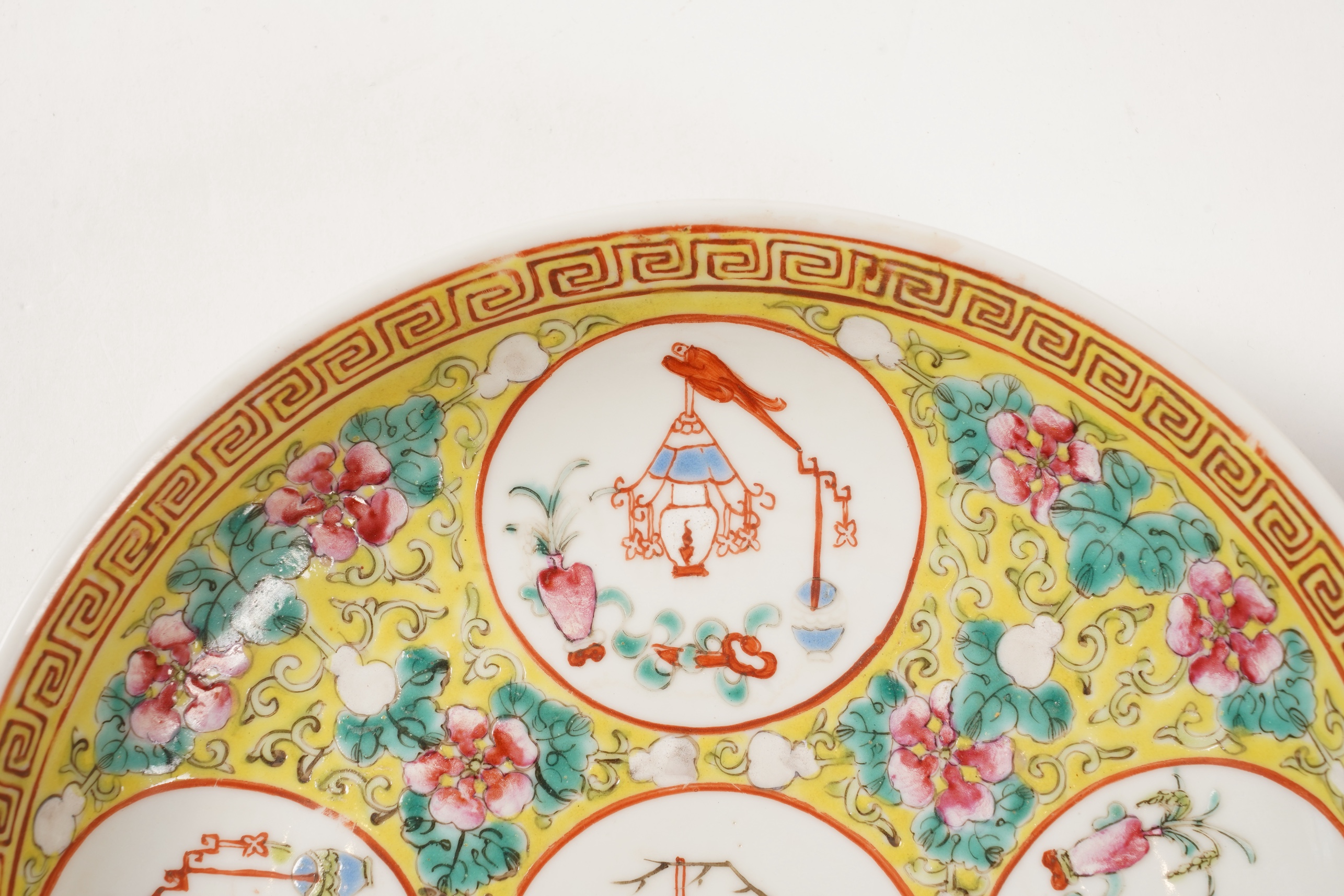 A pair of Chinese yellow ground medallion saucer dishes, Guangxu six character marks, early 20th century